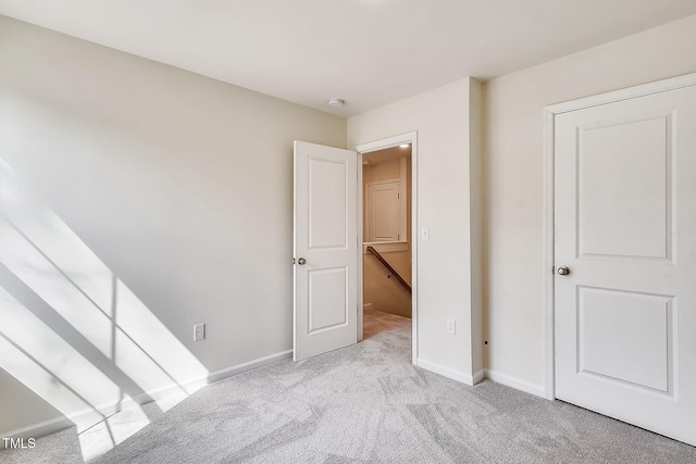 2700 Barrington Dr, Raleigh, NC 27610 - unfurnished bedroom featuring carpet floors and baseboards