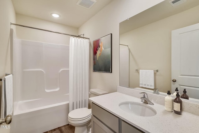 2700 Barrington Dr, Raleigh, NC 27610 - full bath with vanity, toilet, shower / bath combo, and wood finished floors