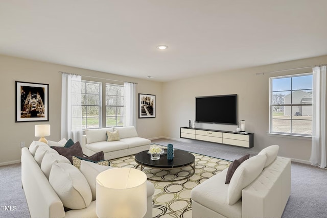 2700 Barrington Dr, Raleigh, NC 27610 - living area with carpet flooring, plenty of natural light, and baseboards