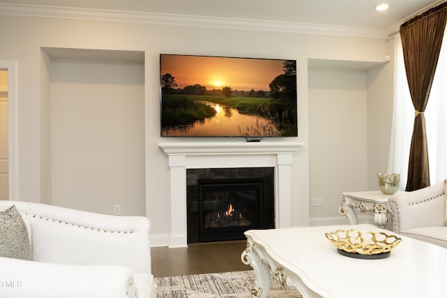 609 Ramsours Mill Dr, Holly Springs, NC 27540 - living room featuring wood finished floors, a glass covered fireplace, crown molding, and recessed lighting