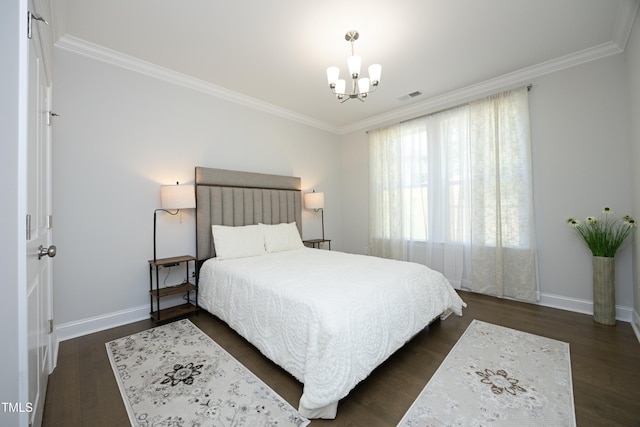 609 Ramsours Mill Dr, Holly Springs, NC 27540 - bedroom with crown molding, a chandelier, dark wood-style floors, and baseboards