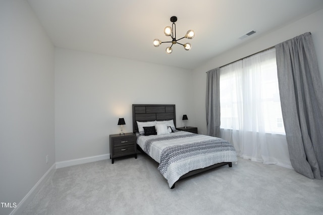 609 Ramsours Mill Dr, Holly Springs, NC 27540 - bedroom with a chandelier, light carpet, and baseboards