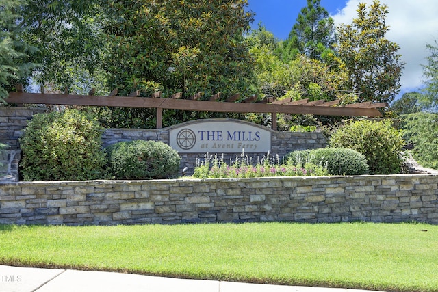 609 Ramsours Mill Dr, Holly Springs, NC 27540 - community sign featuring a lawn