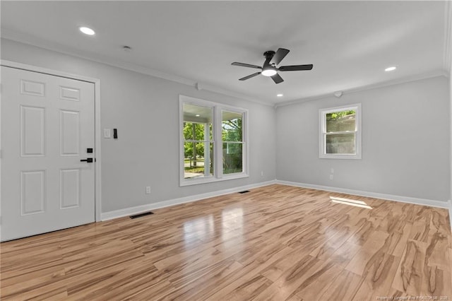 3902 Hartwell Rd, Fayetteville, NC 28304 - spare room with a ceiling fan, crown molding, light wood finished floors, baseboards, and recessed lighting