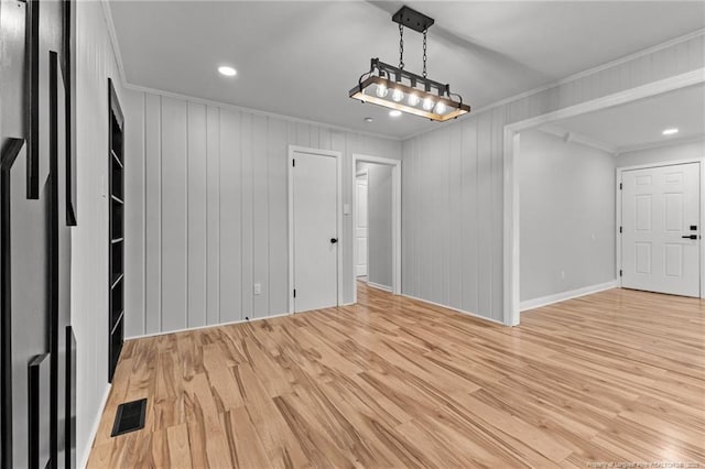 3902 Hartwell Rd, Fayetteville, NC 28304 - unfurnished dining area with light wood-style floors, ornamental molding, recessed lighting, and baseboards