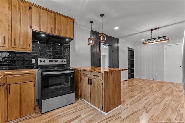 3902 Hartwell Rd, Fayetteville, NC 28304 - kitchen with stainless steel range with electric cooktop, under cabinet range hood, light wood finished floors, backsplash, and brown cabinets