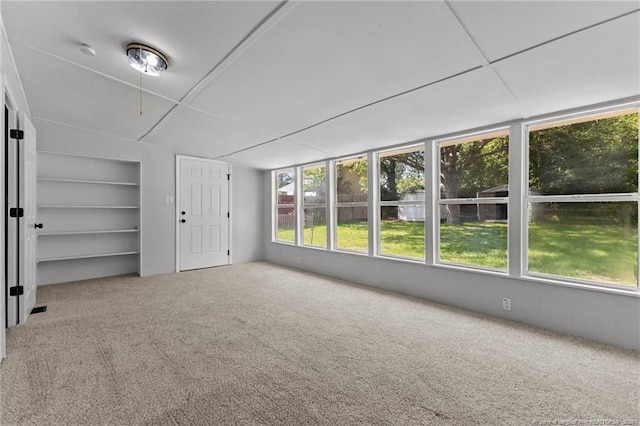 3902 Hartwell Rd, Fayetteville, NC 28304 - empty room with carpet, built in features, and attic access