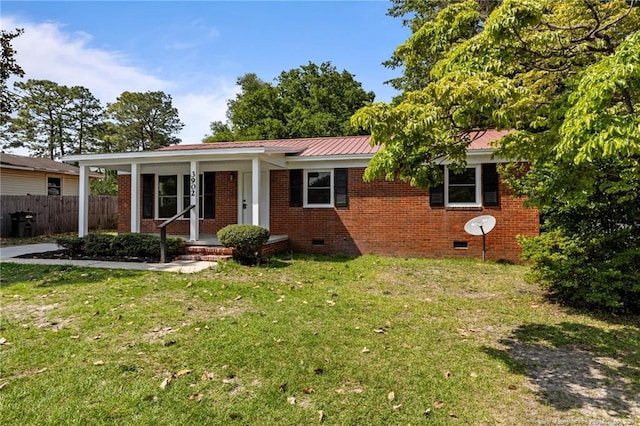 3902 Hartwell Rd, Fayetteville, NC 28304 - ranch-style home with crawl space, metal roof, covered porch, and brick siding