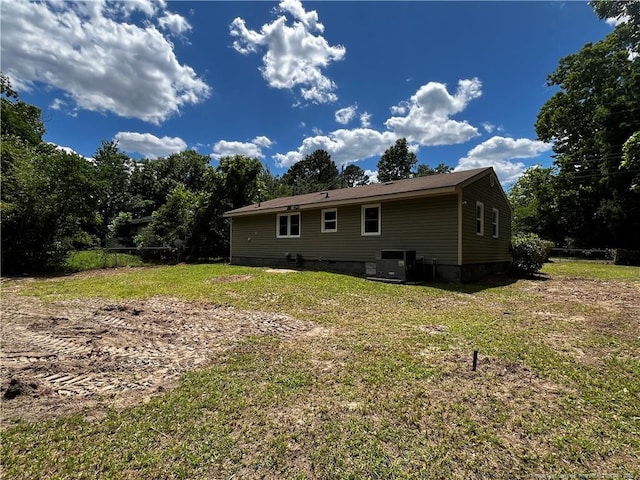 117 Leona Ave, Fayetteville, NC 28314 - rear view of property with crawl space and central AC unit