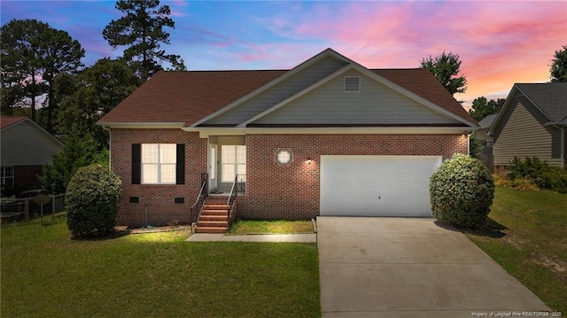 926 Foxhunt Ln, Fayetteville, NC 28314 - view of front of property featuring an attached garage, a front yard, brick siding, and concrete driveway
