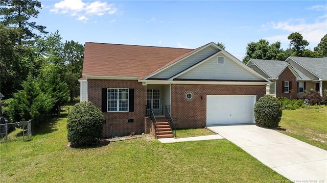 926 Foxhunt Ln, Fayetteville, NC 28314 - view of front of house featuring an attached garage, brick siding, and driveway