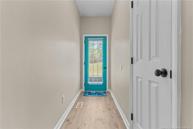 926 Foxhunt Ln, Fayetteville, NC 28314 - doorway to outside with light wood-type flooring and baseboards