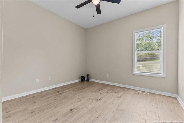 926 Foxhunt Ln, Fayetteville, NC 28314 - spare room featuring light wood-style flooring, a ceiling fan, and baseboards
