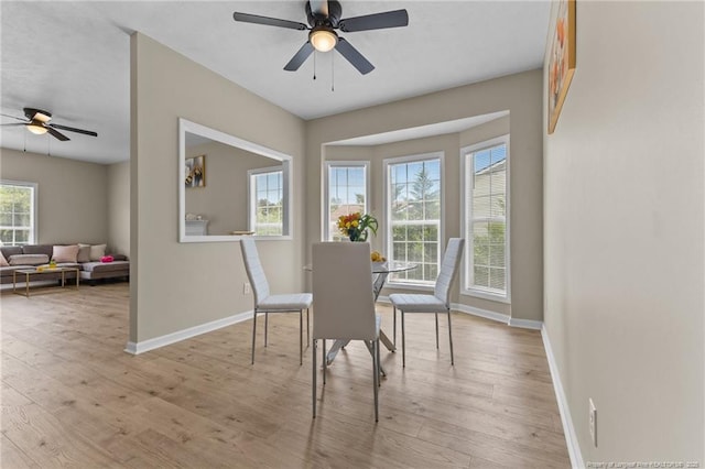 926 Foxhunt Ln, Fayetteville, NC 28314 - dining area with a ceiling fan, baseboards, and light wood-style floors