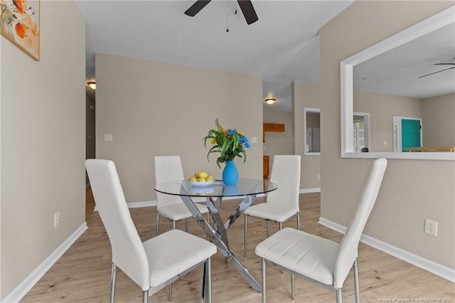 926 Foxhunt Ln, Fayetteville, NC 28314 - dining room featuring ceiling fan, wood finished floors, and baseboards