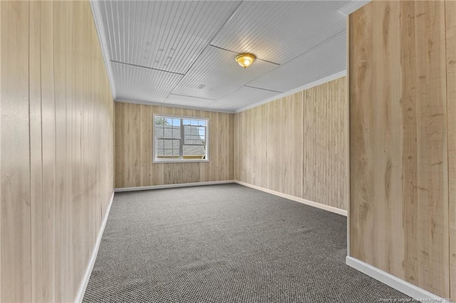 926 Foxhunt Ln, Fayetteville, NC 28314 - empty room with carpet, wood walls, and baseboards