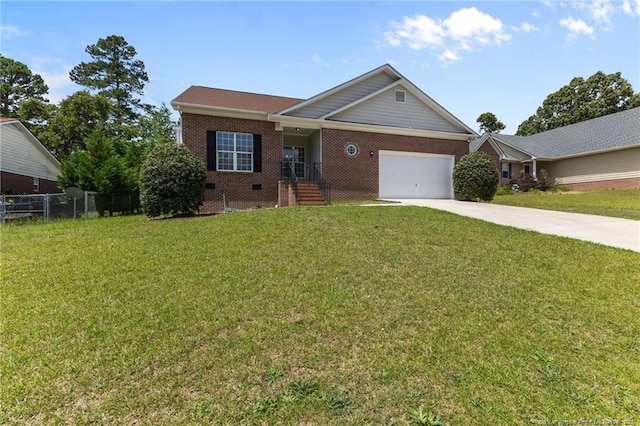 926 Foxhunt Ln, Fayetteville, NC 28314 - view of front of house with driveway, brick siding, and an attached garage