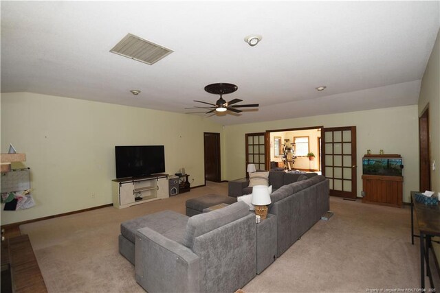 4207 Aldwych St, Lumberton, NC 28358 - living room featuring light colored carpet, ceiling fan, and baseboards