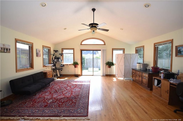 4207 Aldwych St, Lumberton, NC 28358 - living room with ceiling fan, light wood-style floors, lofted ceiling, and baseboards