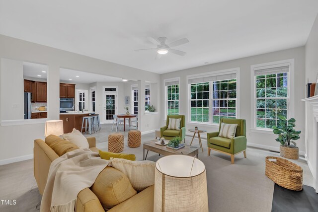 522 N Scotswood Blvd, Hillsborough, NC 27278 - living area with ceiling fan, baseboards, a fireplace, light carpet, and recessed lighting