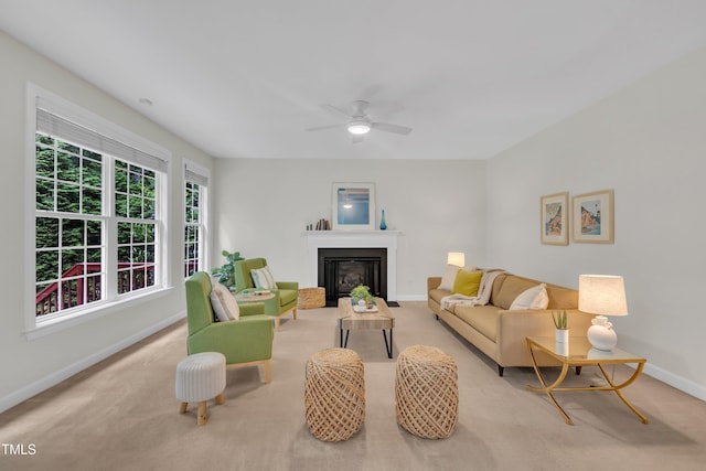 522 N Scotswood Blvd, Hillsborough, NC 27278 - carpeted living area featuring baseboards, a ceiling fan, and a glass covered fireplace