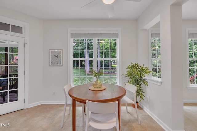 522 N Scotswood Blvd, Hillsborough, NC 27278 - dining area with ceiling fan, healthy amount of natural light, light tile patterned flooring, and baseboards