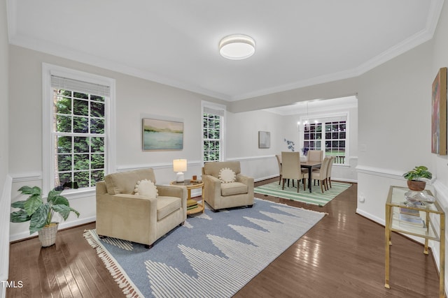 522 N Scotswood Blvd, Hillsborough, NC 27278 - living area featuring hardwood / wood-style flooring, crown molding, a chandelier, and a wainscoted wall