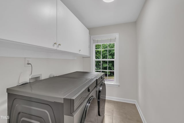 522 N Scotswood Blvd, Hillsborough, NC 27278 - laundry area with cabinet space, separate washer and dryer, baseboards, and light tile patterned flooring