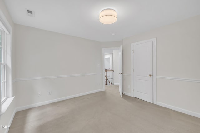 522 N Scotswood Blvd, Hillsborough, NC 27278 - unfurnished room featuring baseboards, light carpet, and healthy amount of natural light