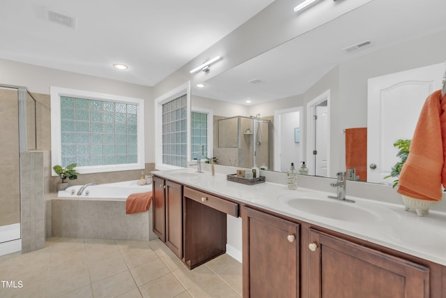 522 N Scotswood Blvd, Hillsborough, NC 27278 - bathroom with double vanity, a shower stall, tile patterned floors, a garden tub, and recessed lighting
