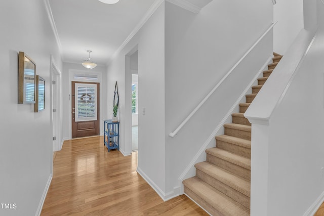 151 Bridge St, Hillsborough, NC 27278 - foyer entrance featuring crown molding, stairs, baseboards, and light wood-type flooring