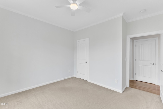 151 Bridge St, Hillsborough, NC 27278 - spare room featuring ornamental molding, light carpet, ceiling fan, and baseboards
