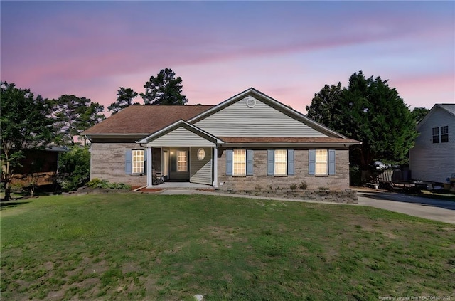 3618 Frierson St, Hope Mills, NC 28348 - ranch-style home with a lawn and brick siding
