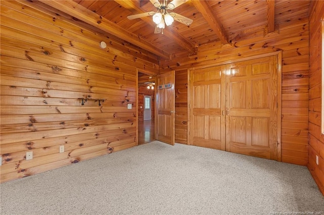 113 Atwood Ter, Stedman, NC 28391 - unfurnished bedroom featuring wood ceiling with exposed beams, carpet, and wooden walls