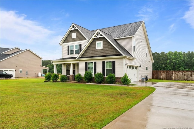 6752 Running Fox Rd, Hope Mills, NC 28348 - craftsman-style home featuring driveway, an attached garage, and a shingled roof