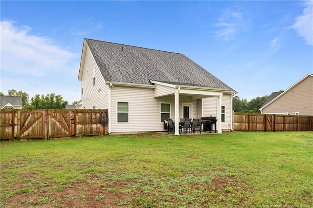 6752 Running Fox Rd, Hope Mills, NC 28348 - back of house featuring a patio area, a shingled roof, and a gate