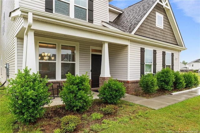 6752 Running Fox Rd, Hope Mills, NC 28348 - view of front of property featuring a porch and roof with shingles