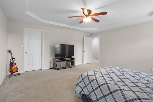 625 Fairfield Cir, Raeford, NC 28376 - carpeted bedroom with a raised ceiling, baseboards, a ceiling fan, and ornamental molding