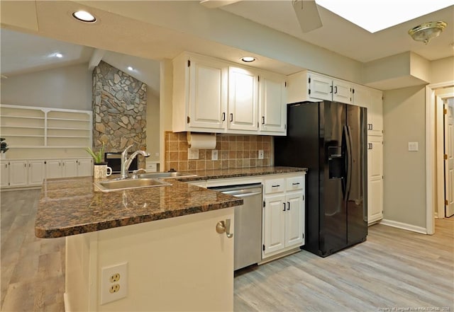 750 Mimosa Dr, Vass, NC 28394 - kitchen featuring black fridge with ice dispenser, dishwasher, a sink, a peninsula, and light wood-type flooring