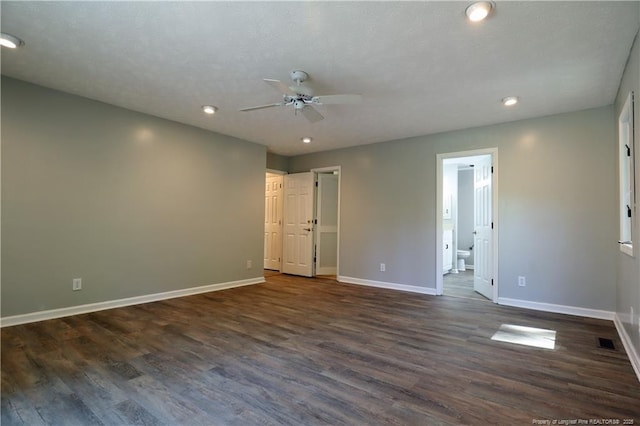 750 Mimosa Dr, Vass, NC 28394 - unfurnished bedroom featuring baseboards, dark wood finished floors, recessed lighting, ensuite bath, and ceiling fan