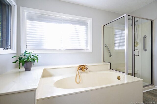 750 Mimosa Dr, Vass, NC 28394 - full bath featuring a bath, a shower stall, and healthy amount of natural light