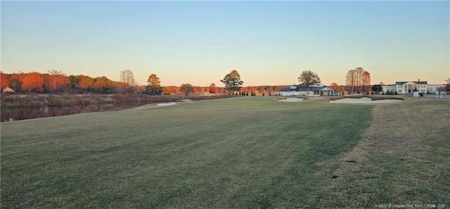 750 Mimosa Dr, Vass, NC 28394 - yard at dusk with a lawn