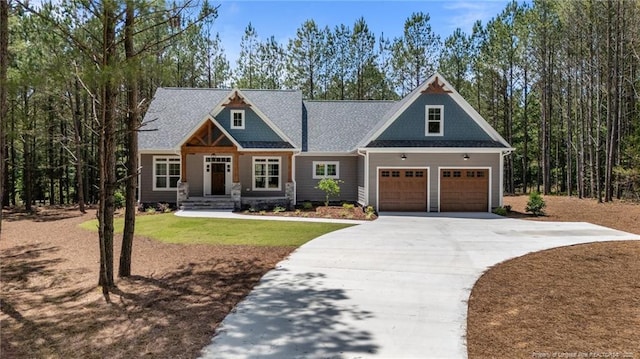 5400 Dowd Rd, West End, NC 27376 - craftsman-style house featuring driveway, a garage, and a front lawn