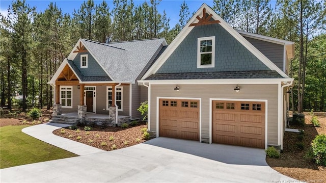 5400 Dowd Rd, West End, NC 27376 - craftsman-style home featuring concrete driveway, covered porch, and a shingled roof