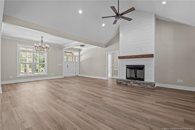 5400 Dowd Rd, West End, NC 27376 - unfurnished living room with a chandelier, ceiling fan, baseboards, a fireplace, and recessed lighting