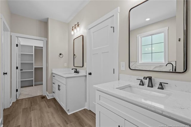 5400 Dowd Rd, West End, NC 27376 - bathroom with wood finished floors and two vanities