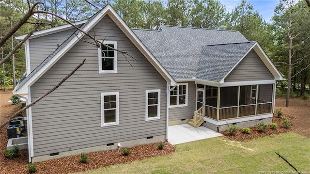 5400 Dowd Rd, West End, NC 27376 - rear view of house with crawl space, a sunroom, a shingled roof, and a patio