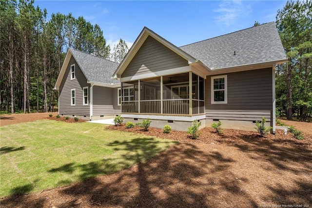 5400 Dowd Rd, West End, NC 27376 - back of property featuring crawl space, a sunroom, roof with shingles, and a lawn