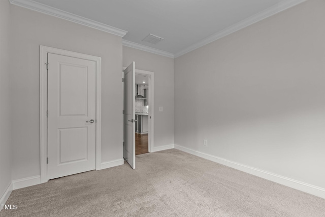 3020 Mavisbank Cir, Apex, NC 27502 - unfurnished bedroom featuring light colored carpet, ornamental molding, and baseboards
