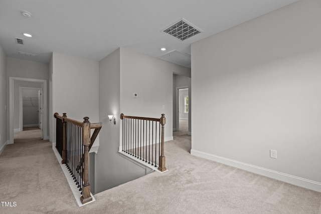3020 Mavisbank Cir, Apex, NC 27502 - corridor featuring an upstairs landing, carpet floors, attic access, baseboards, and recessed lighting